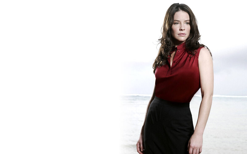 Woman in Red Blouse — Serious