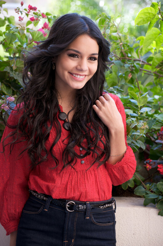 woman in red blouse smiling