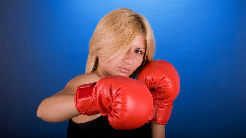 woman in red boxing gloves