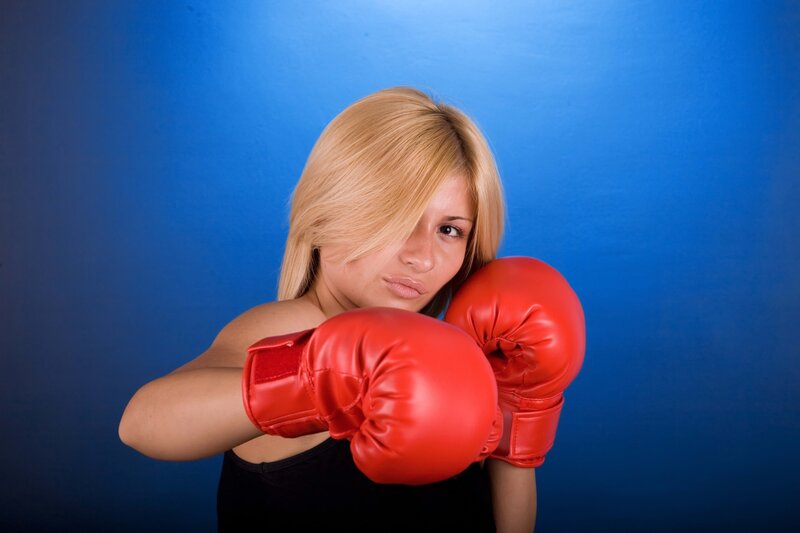 woman in red boxing gloves