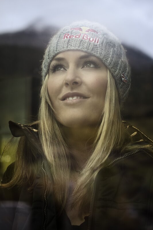 woman in red bull beanie