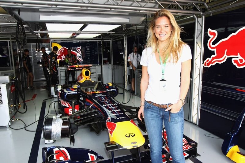 Woman in Red Bull garage