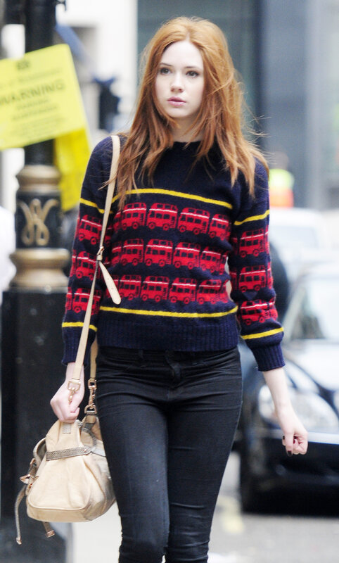 Woman in red bus sweater