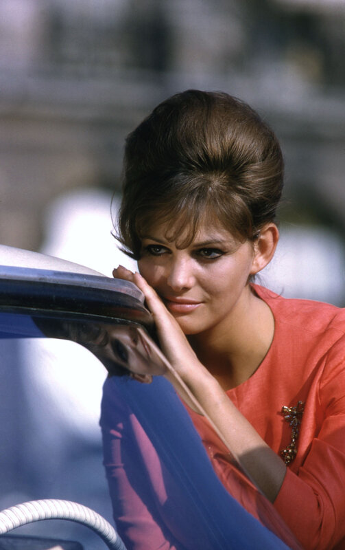 woman in red car