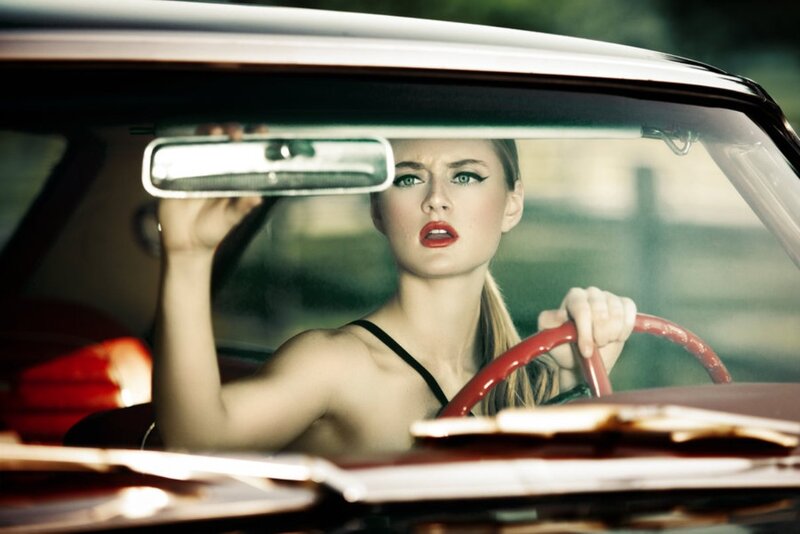 Woman in Red Car — Dramatic, Afternoon, Photograph, Steering Wheel