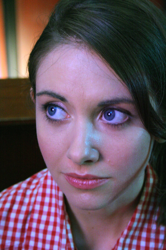 woman in red checkered shirt
