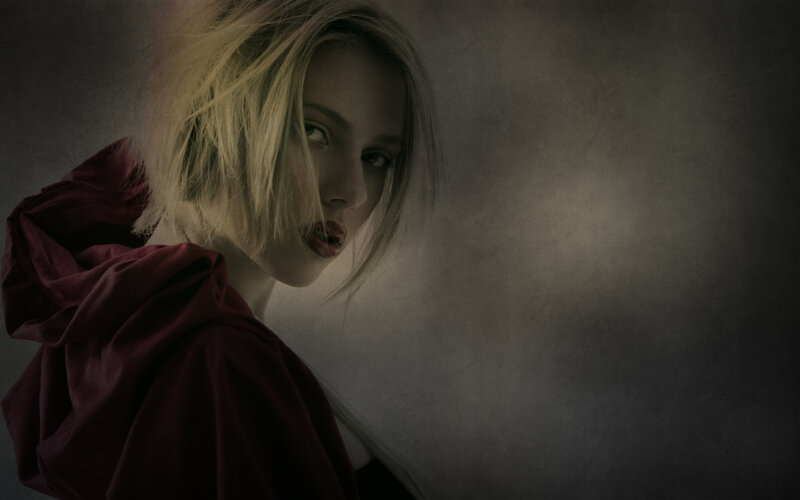 woman in red cloak
