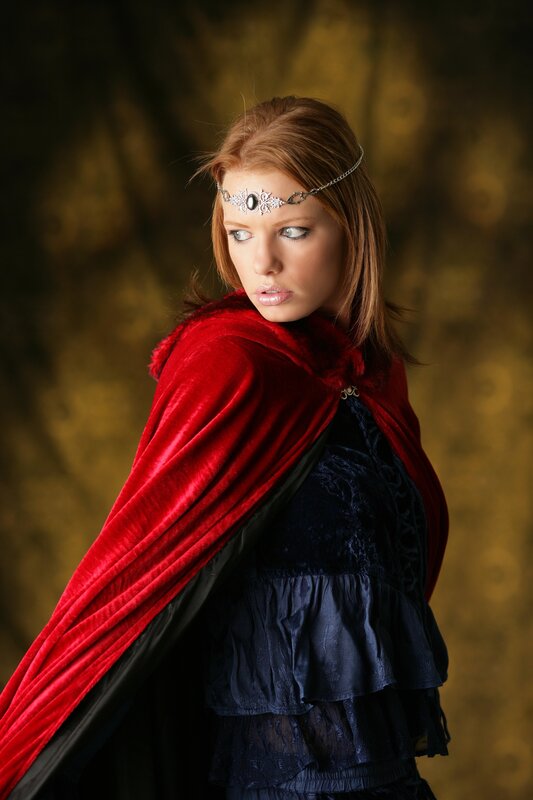 woman in red cloak and headband