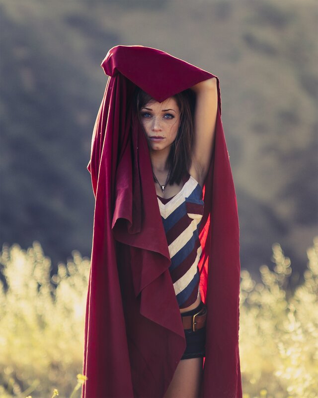 Woman in Red Cloak — Dramatic, Afternoon, Photograph, Striped Top