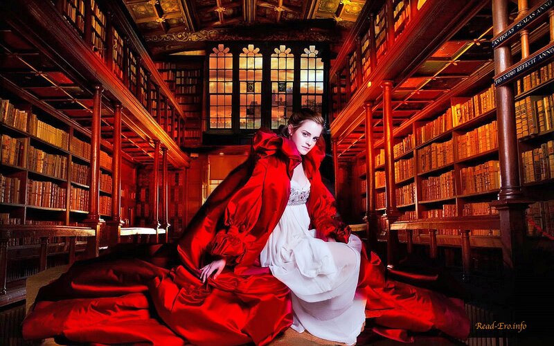 Woman in red cloak in library