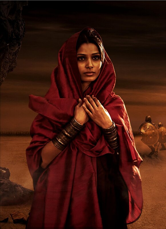 woman in red cloak on battlefield