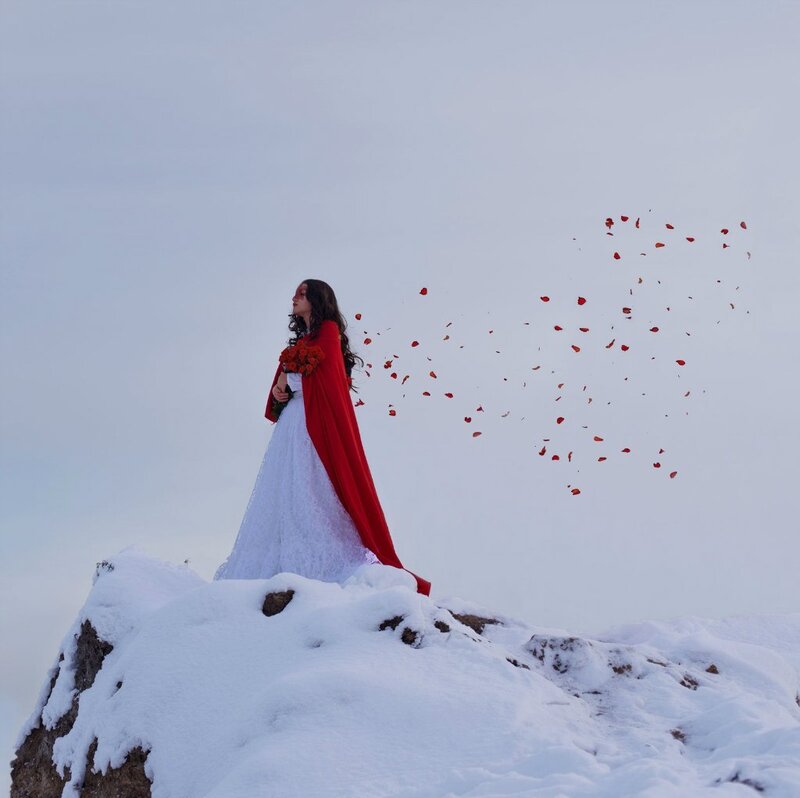Woman in Red Cloak — White, Dramatic