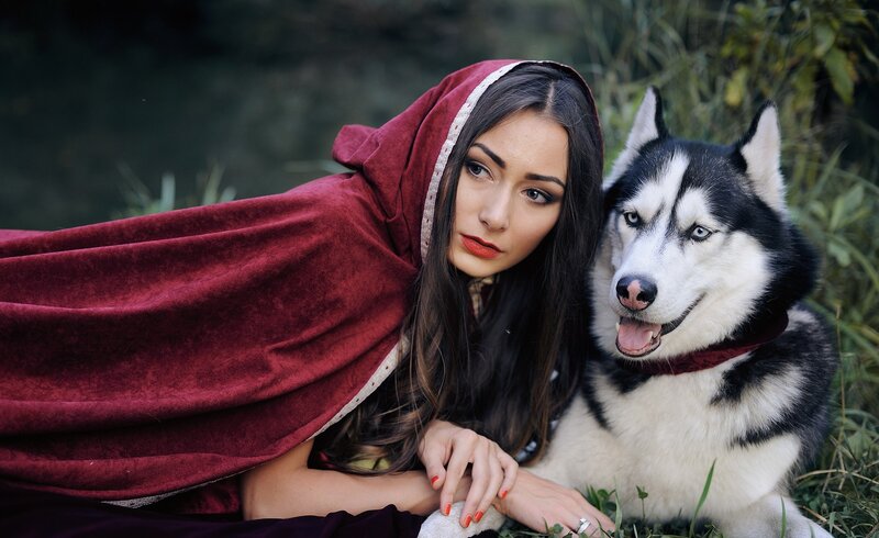 Woman in Red Cloak with Husky — Dramatic