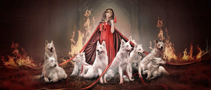 Woman in Red Cloak with Wolves