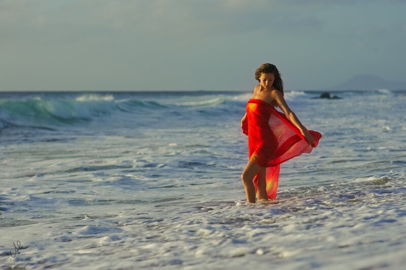 Woman in Red Cloth on Beach — Serene