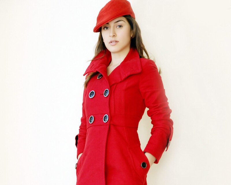 woman in red coat and hat