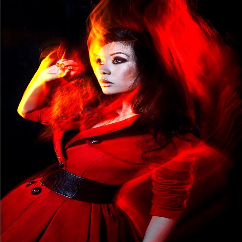 Woman in Red Coat — Dramatic, Photograph