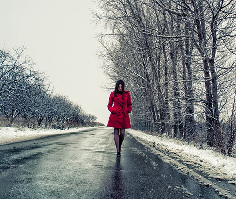 Woman in Red Coat — Dreary