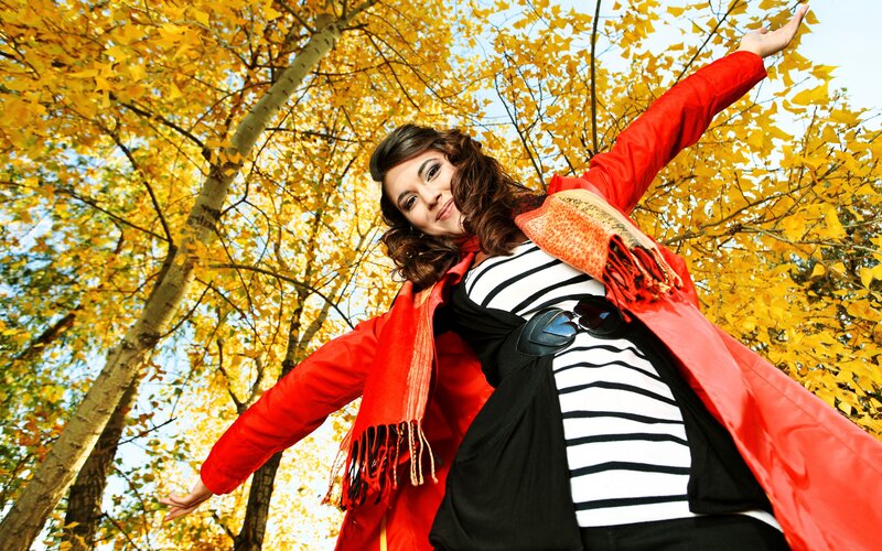 Woman in Red Coat — Joyful