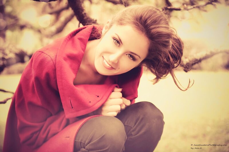 woman in red coat outdoors