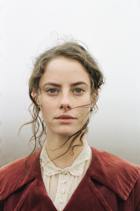 woman in red coat portrait