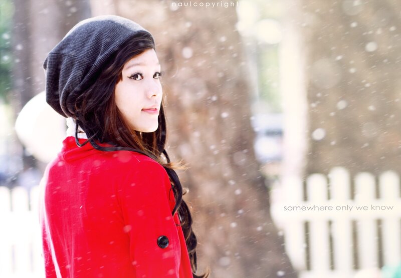 woman in red coat snow