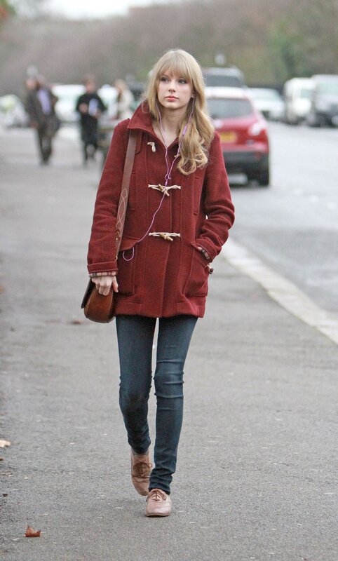 woman in red coat walking