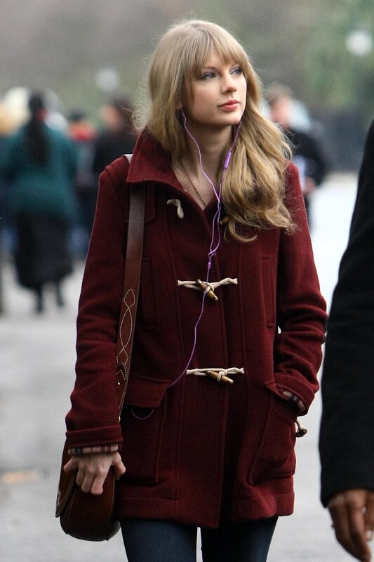woman in red coat walking