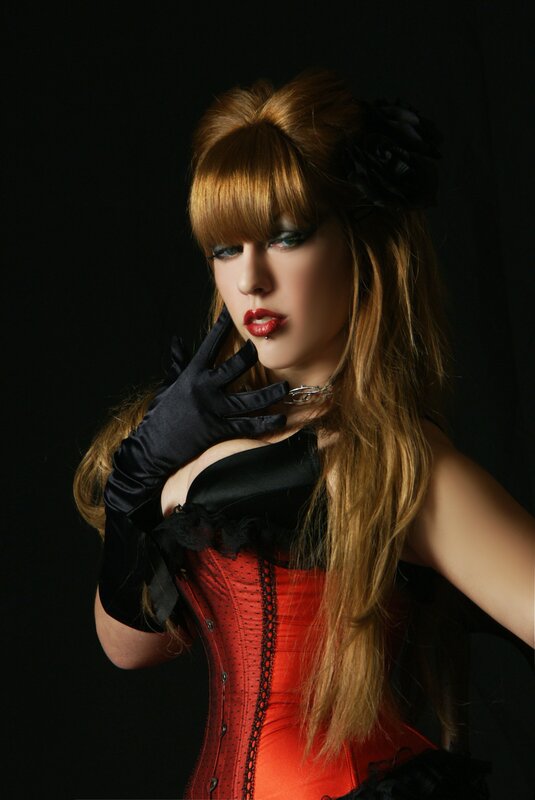 woman in red corset and black gloves