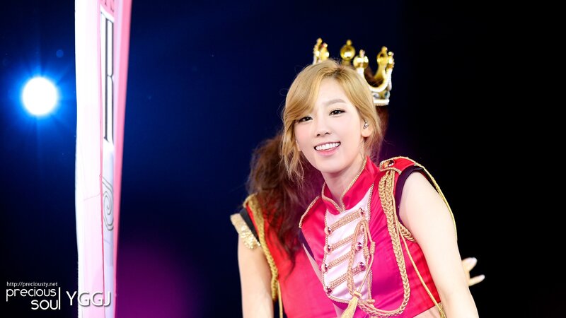 woman in red costume smiling