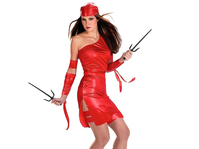 Woman in red costume with weapons