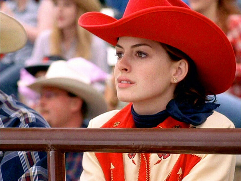 Woman in Red Cowboy Hat — Attentive