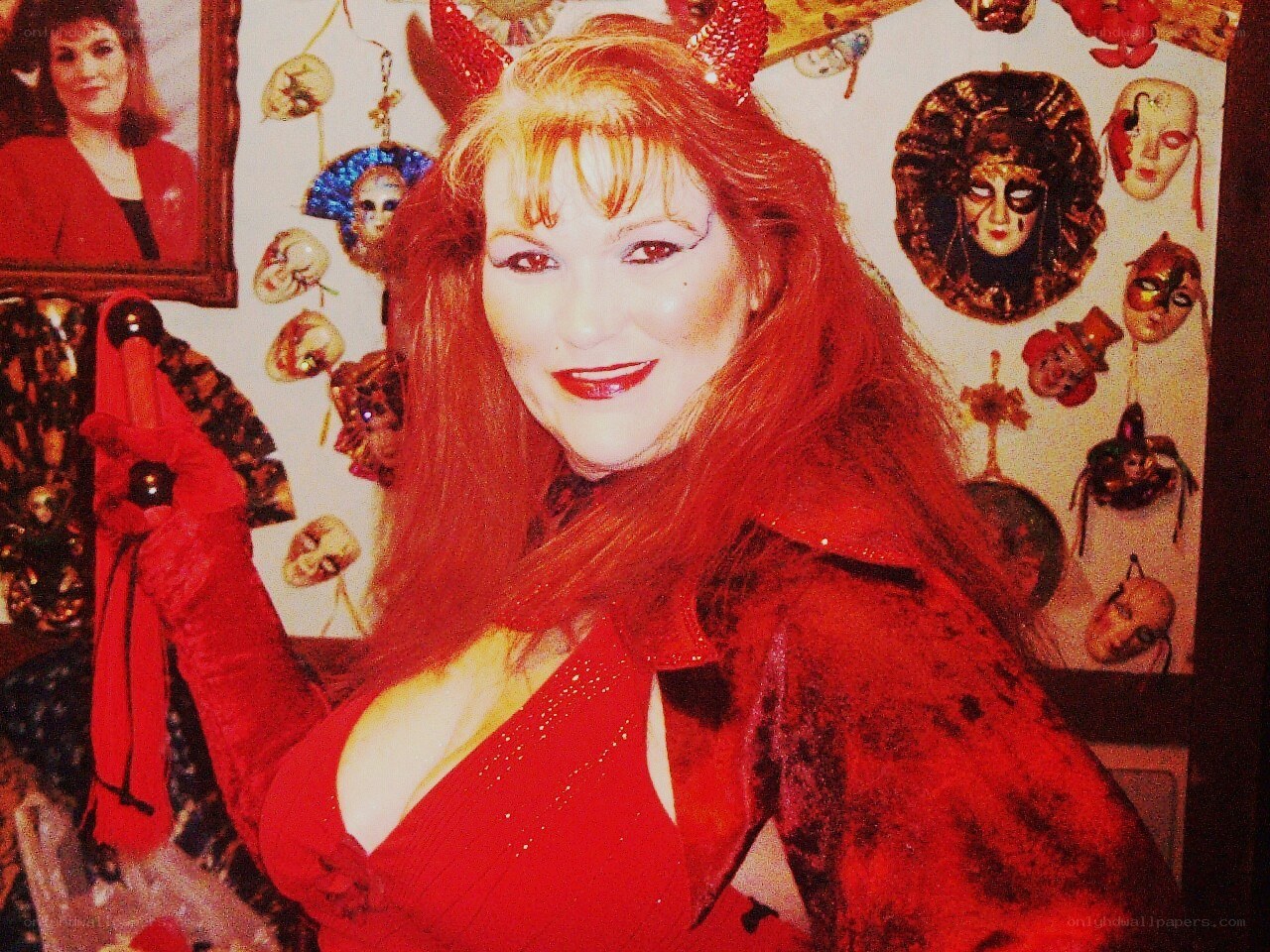 Woman in red devil costume