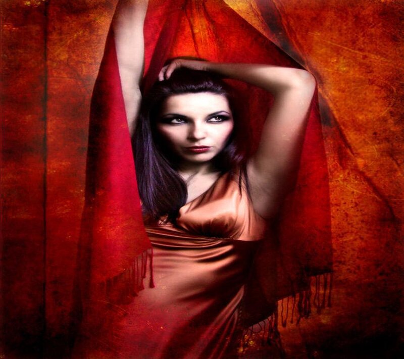 woman in red draped fabric