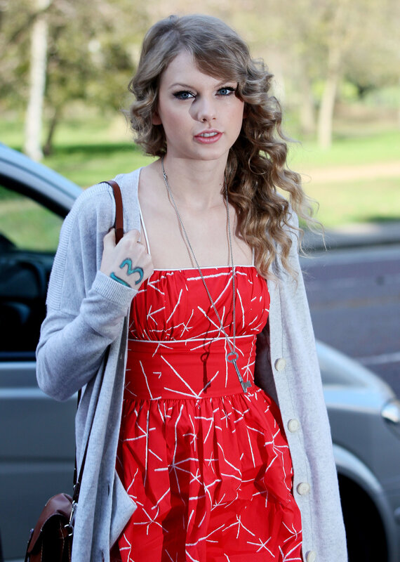 woman in red dress and cardigan