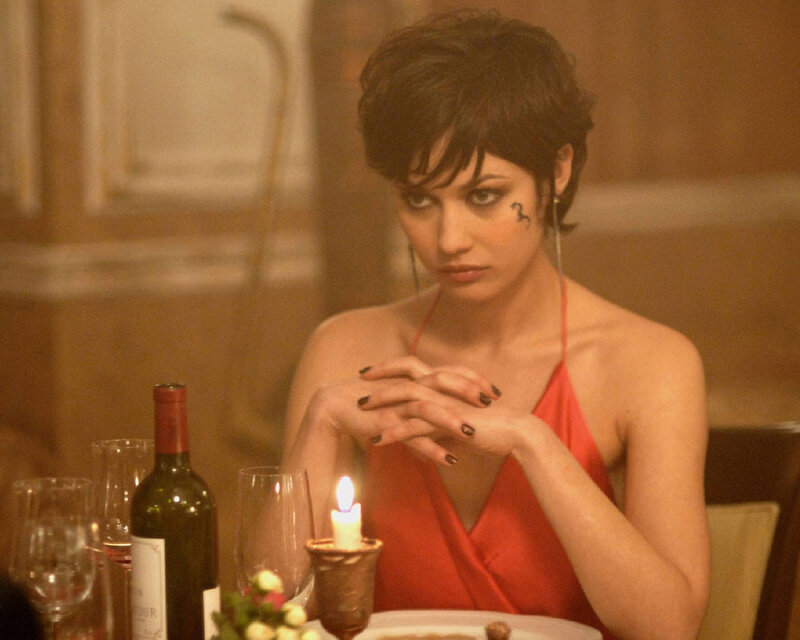 woman in red dress at dinner
