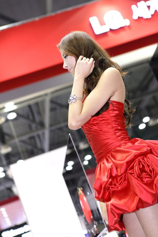 Woman in red dress at event