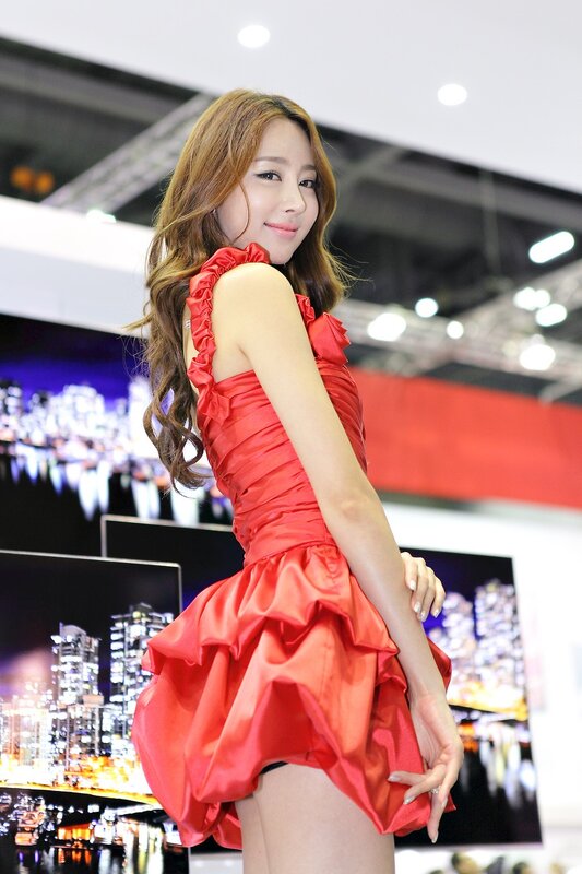 Woman in red dress at event