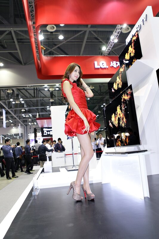 Woman in red dress at LG booth