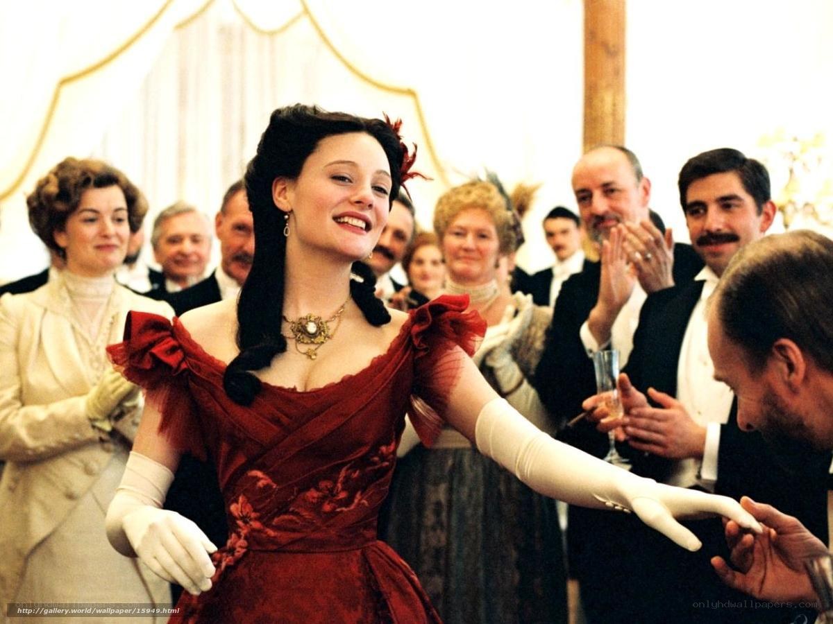 Woman in red dress at party
