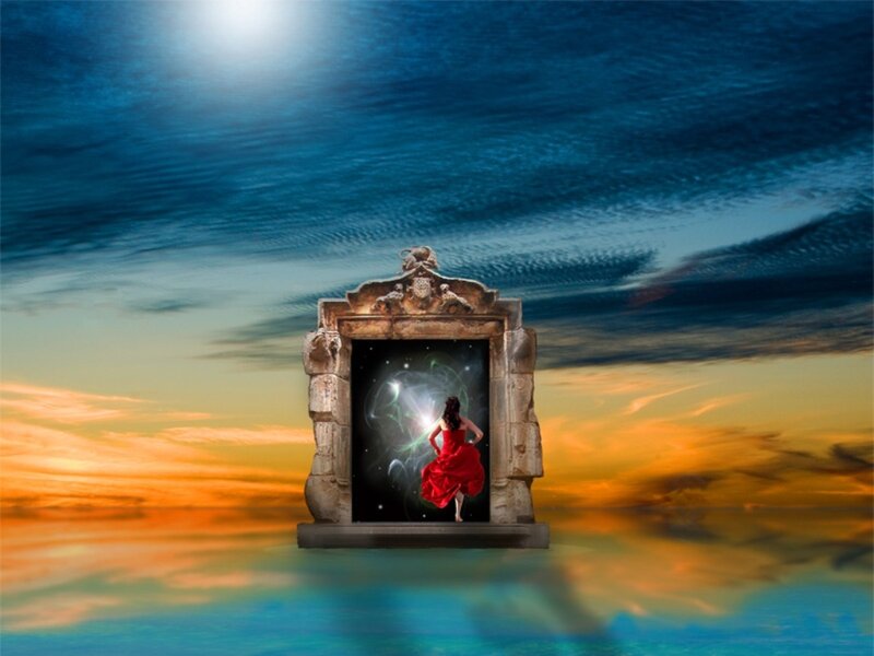 woman in red dress at portal