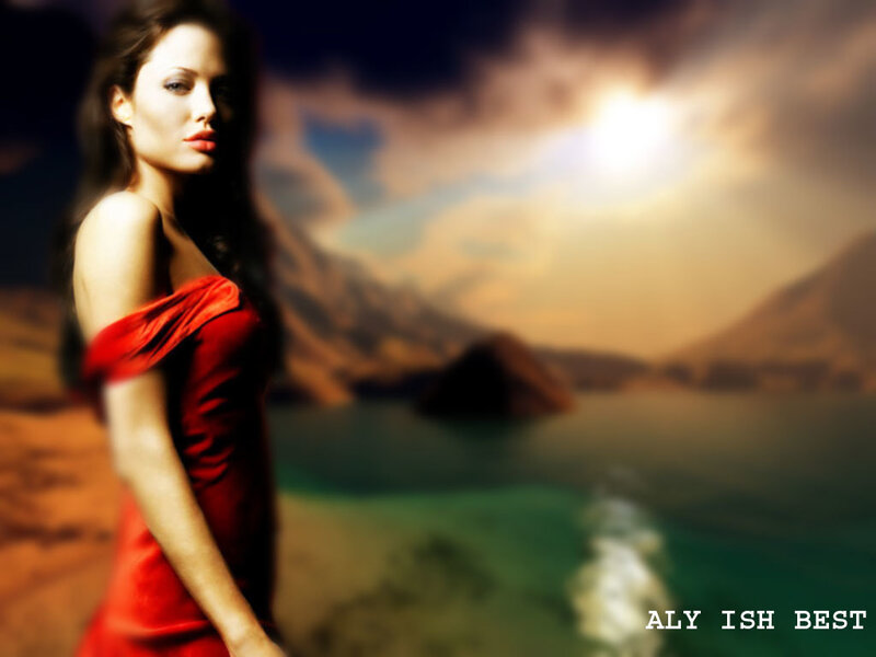 woman in red dress by lake