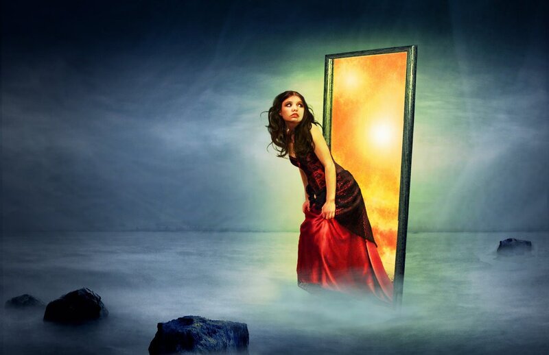 woman in red dress by portal