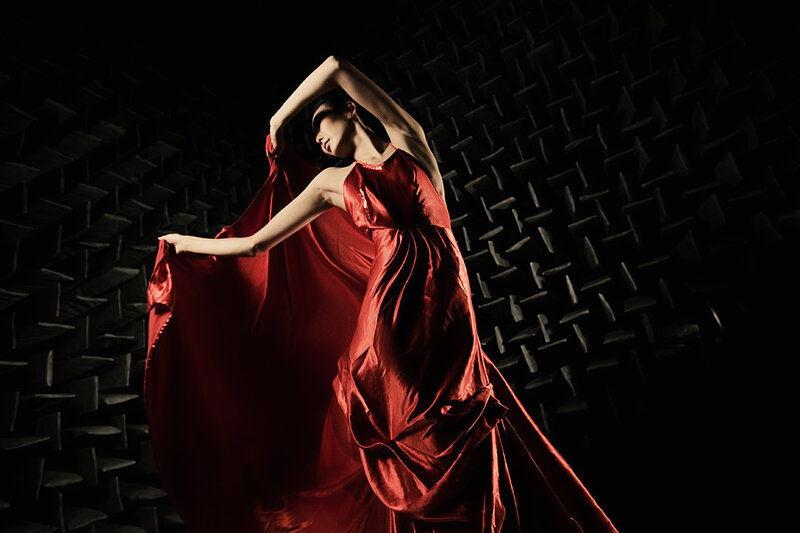 woman in red dress dancing