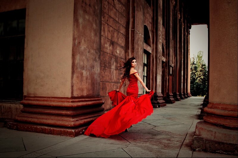 Woman in Red Dress — Dramatic, Afternoon, Photograph, Columns, Building