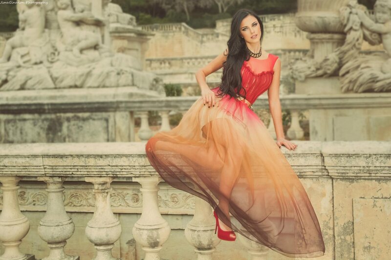 Woman in Red Dress — Dramatic, Afternoon, Photograph, Statues