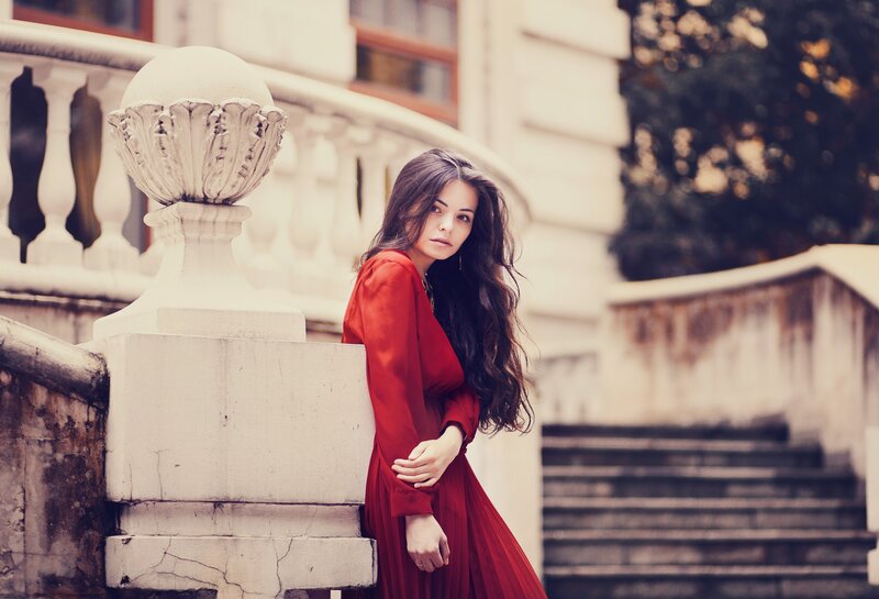 Woman in Red Dress — Dramatic, Afternoon, Photograph, Stone Railing