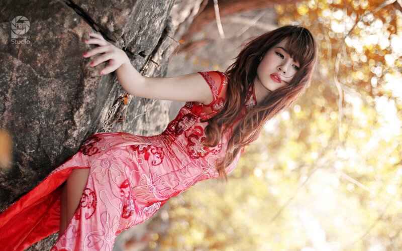 Woman in Red Dress — Dramatic, Autumn, Photograph, Rock