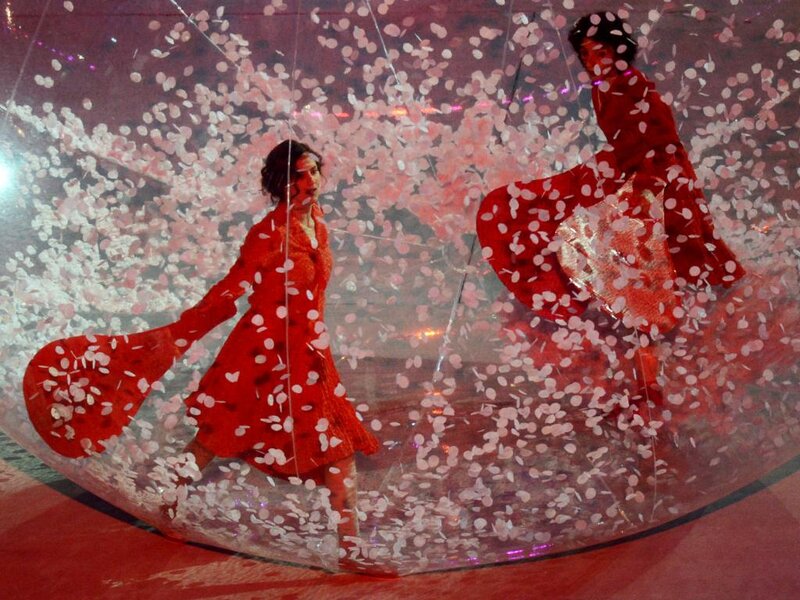 Woman in Red Dress — Dramatic, Night, Photograph, Confetti