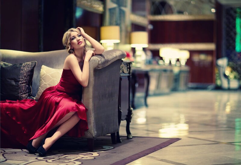 Woman in Red Dress — Dramatic, Night, Photograph, Couch, Pillows